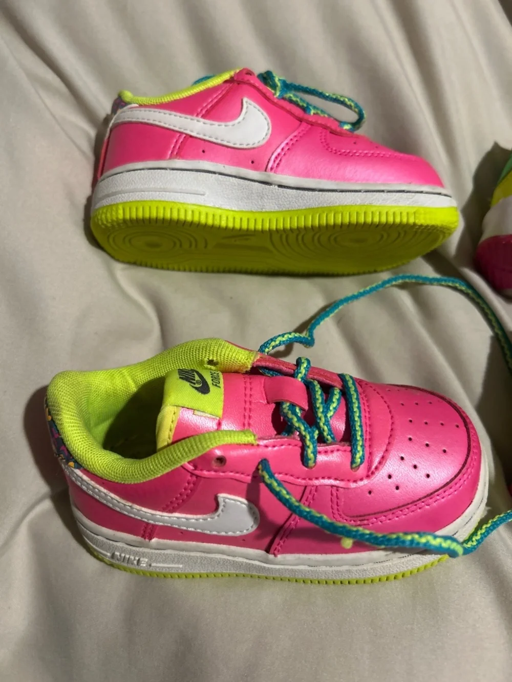 Two pairs of Nike toddler size 6c sneakers